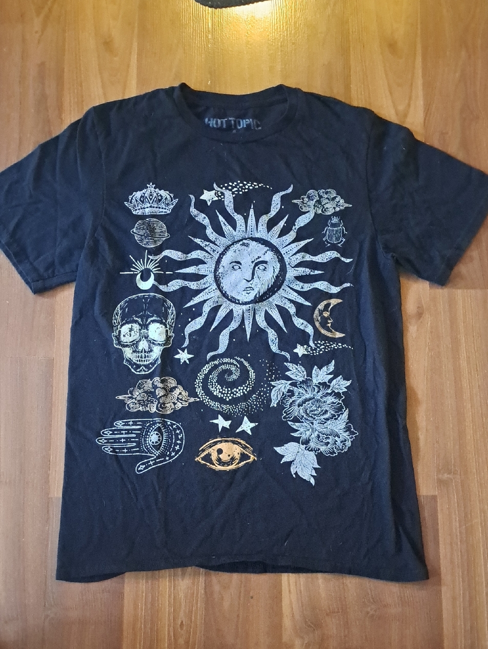 Hot Topic Black Graphic Tee with Celestial Sun and Skull Motifs